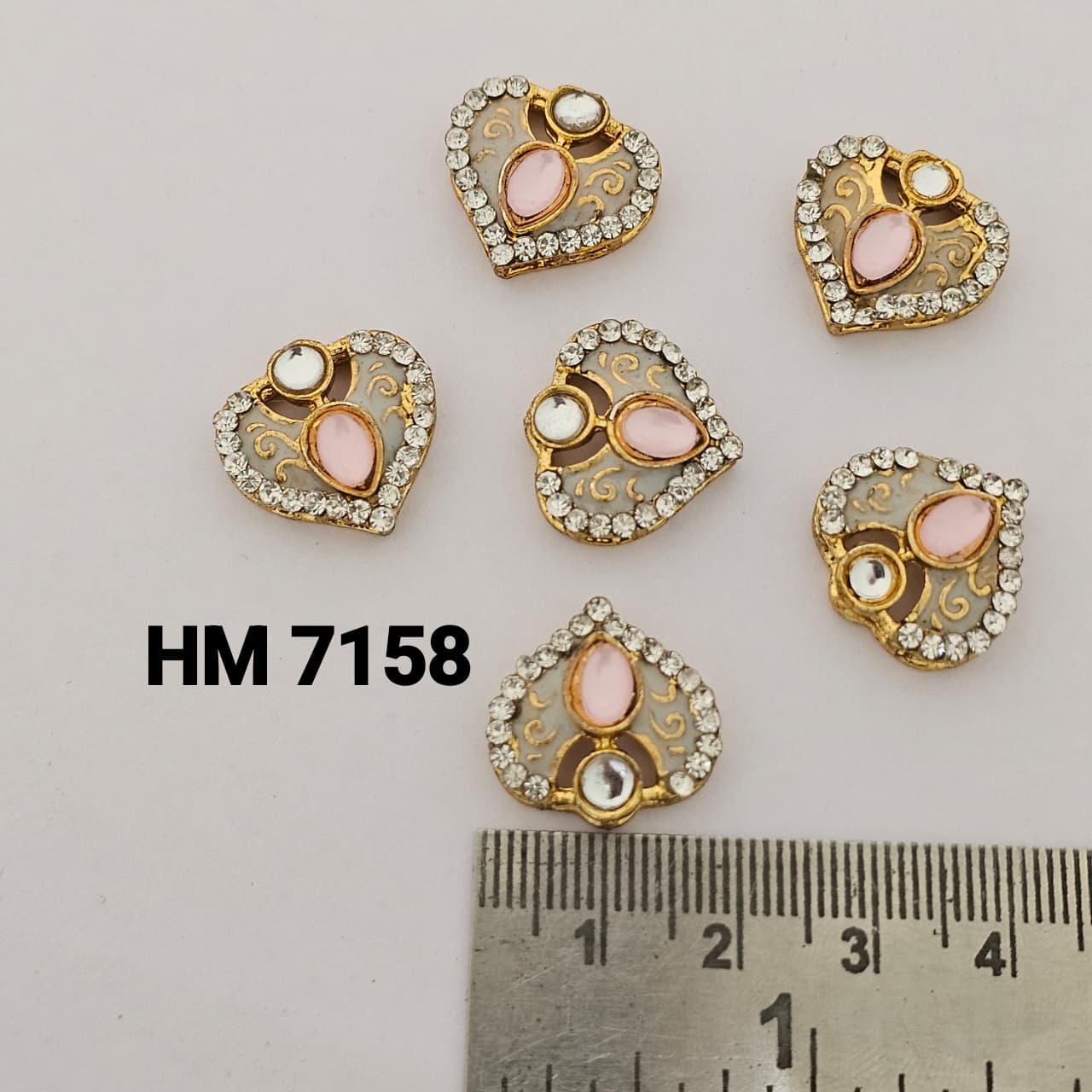 heart-shaped base featuring a teardrop-shaped stone 12 pcs (HM 7158)