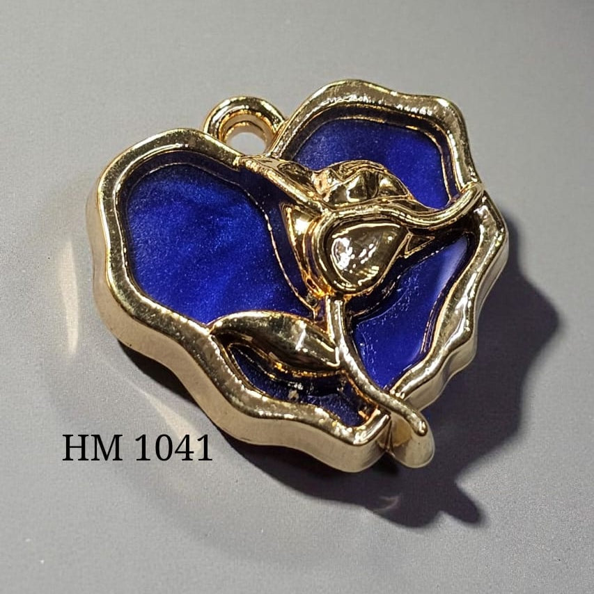 Gold rose with blue center on a gray background, labeled 'HM 1041'.