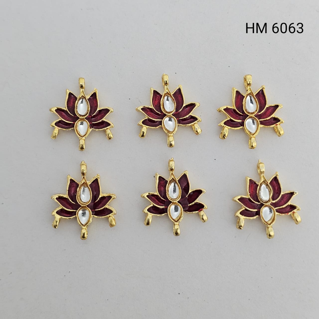 Gold-Plated Lotus Pendant with Maroon Enamel and Kundan Stones(PER PKT 12 PCS)-  (Model HM 6063)